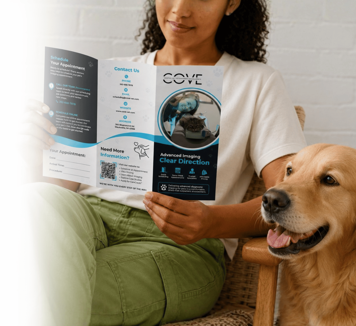 Pet owner reviewing The COVE diagnostic imaging brochure with her dog before an appointment Pet owner reviewing The COVE diagnostic imaging brochure with her dog before an appointment